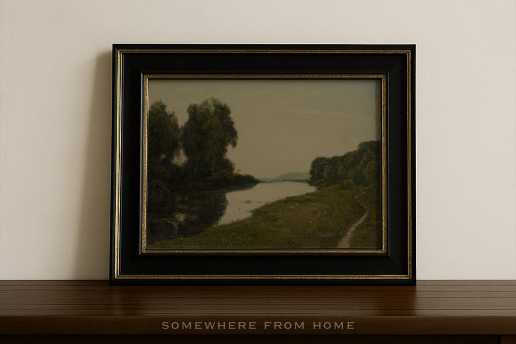Framed landscape painting on a wooden shelf with 'Somewhere from Home' text.