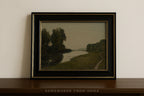 Framed landscape painting on a wooden shelf with 'Somewhere from Home' text.