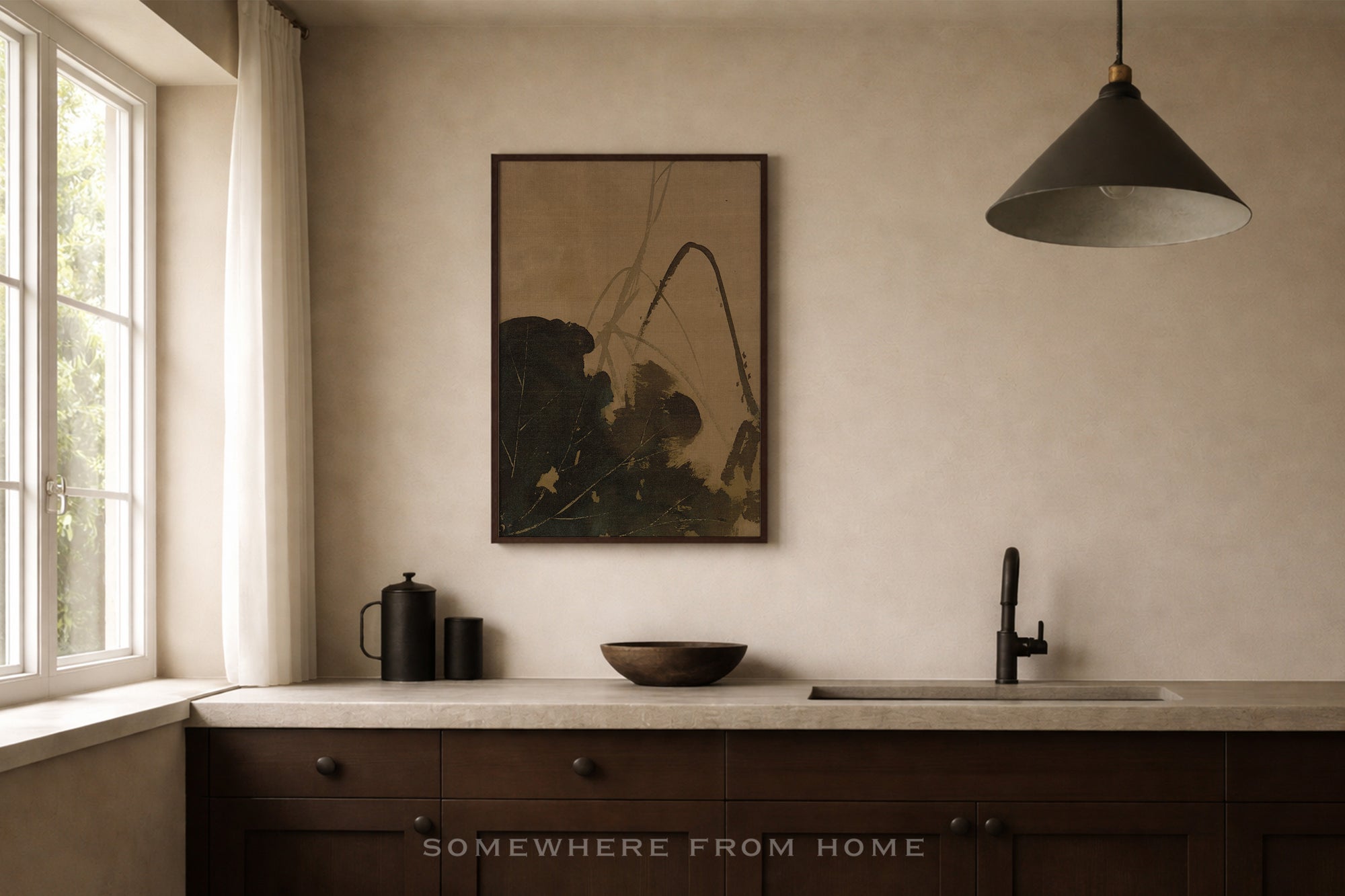 Modern kitchen with dark wood cabinets, white countertop, and a framed artwork on the wall.