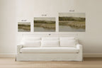 Three framed landscape wall art prints are displayed above a white sofa in a bright room, with size labels overlaid: 16"x20" on the left, 24"x36" in the middle, and 30"x40" on the right, plus a 90" width measurement across the set.