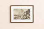 A framed art print featuring a sepia-toned landscape sketch with mountains, trees, and water, displayed on a light beige wall.