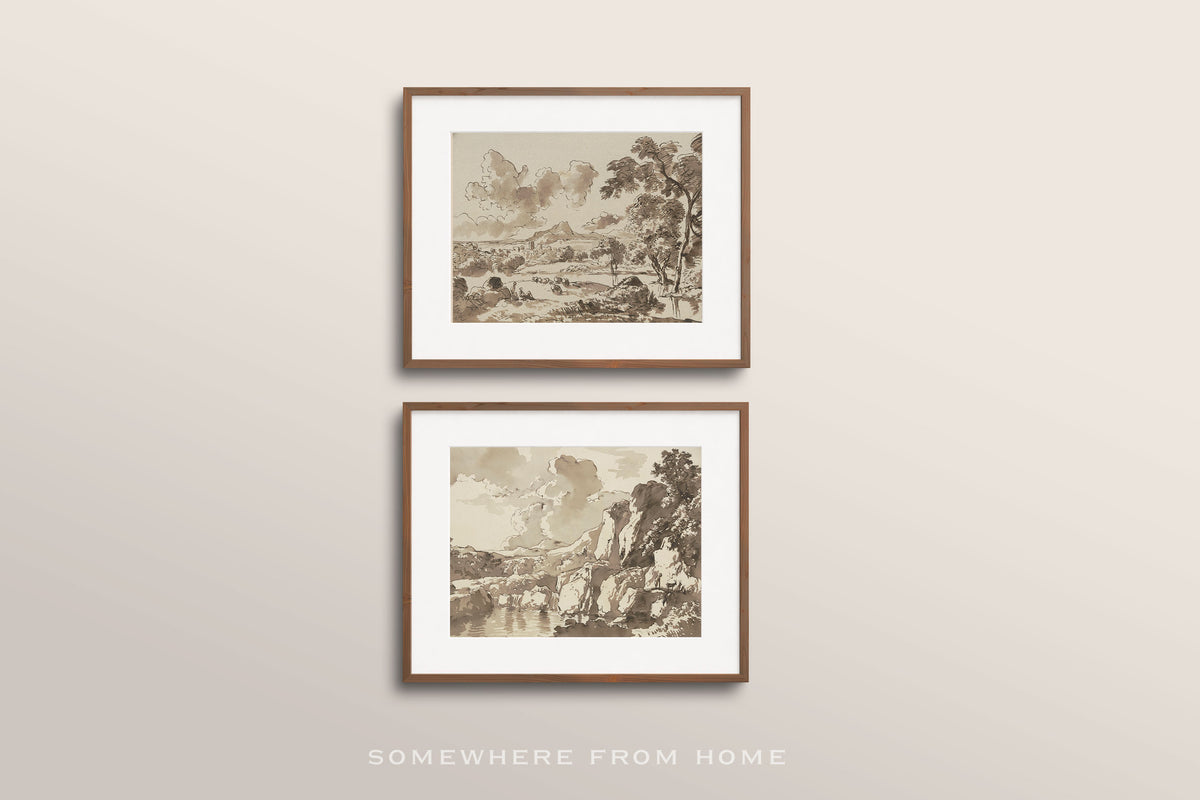 Two framed sepia-toned landscape art prints with white mats and thin brown frames, displayed vertically on a light beige wall. The text 'SOMEWHERE FROM HOME' appears below the frames.