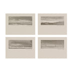 Set of four monochrome landscape art prints arranged in a 2x2 grid on a white background. Each print features a narrow horizontal sketch or photograph of a seascape or coastal scene with a wide beige border.